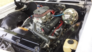 Engine bay of 1969 Chevelle wired with the Infinitybox system