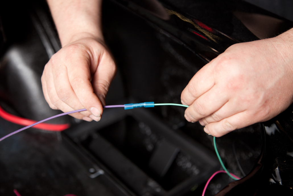 Picture showing example of splicing wires in our 1967 Mustang Install of the Infinitybox wiring system.
