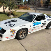 Side shot of Player's LTD Camaro wired with Infinitybox Express Track Car Kit